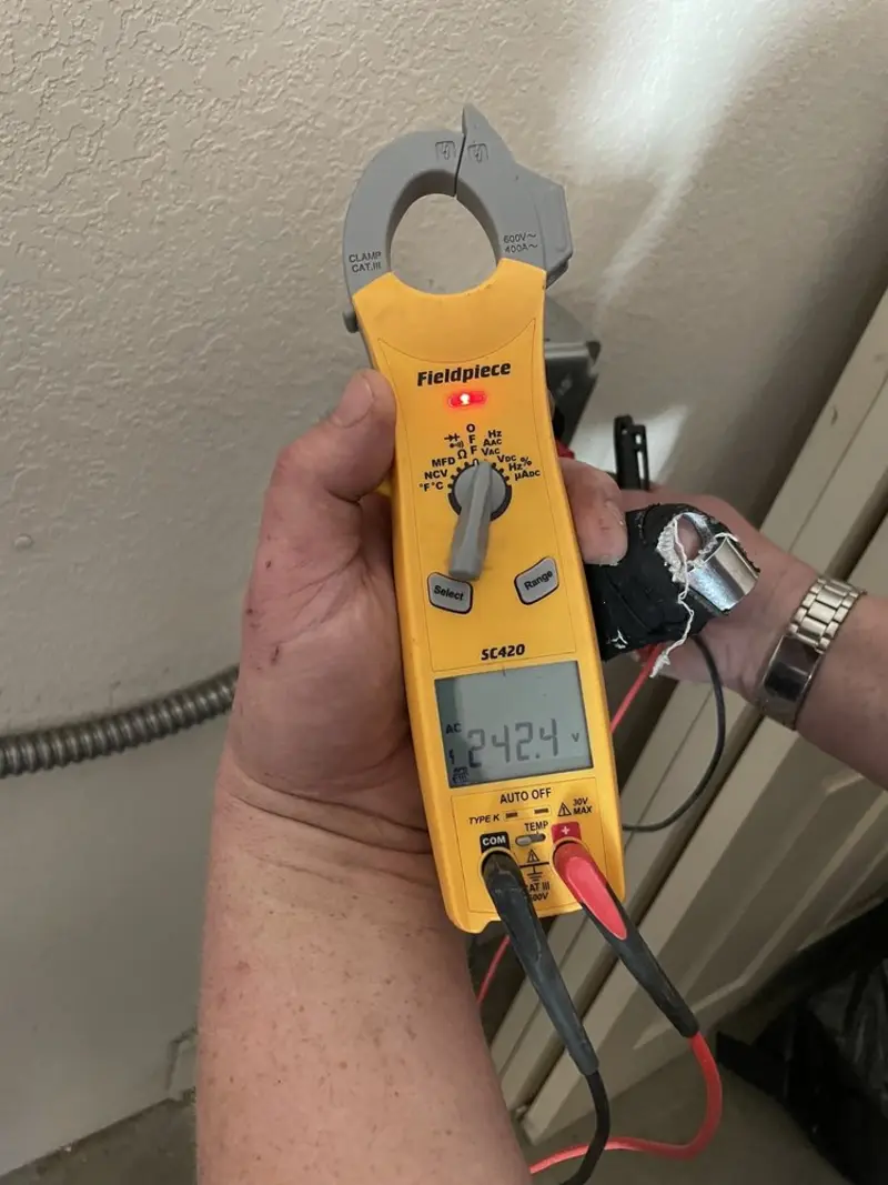 Voltage testing with clamp meter during Ceiling Fan Installation in Red Hill